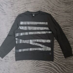 H&M sweater with coated tape print